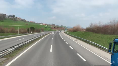 Point-of-view-footage-while-driving-from-Switzerland-to-Germany-on-a-beautiful-winter-afternoon