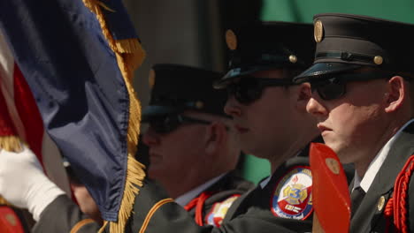 Color-Guard-marching-during-small-town-parade,-Slow-Motion