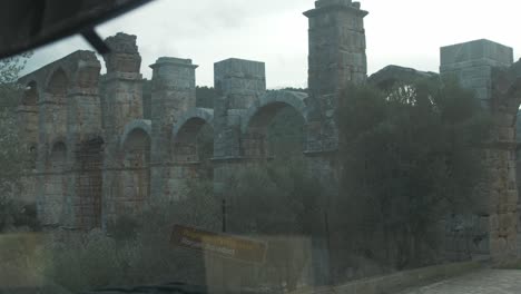 Roman-aqueduct-window-shot-vehicle