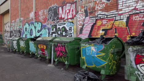 Trashcan-graffitis-in-Lisbon-street,-Portugal