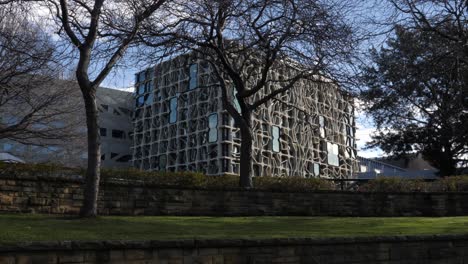 Sun-fades-over-Menzie-Research-building-in-inner-city-Hobart,-Tasmania,-Australia