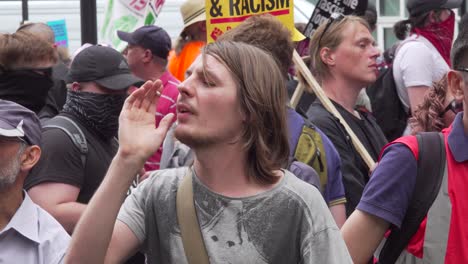 Antifa-gather-outside-the-BBC-studio-to-protest-Tommy-Robinson-in-London,-UK