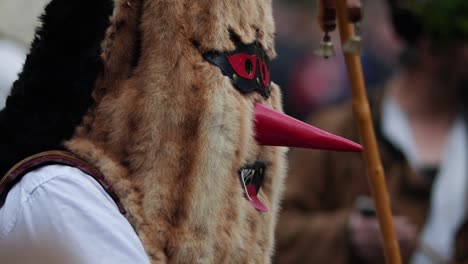 Funny-and-somewhat-scary-mask-with-red-elongated-nose-and-furry-face
