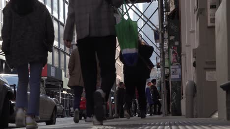 Young-people-on-street,-low-angle