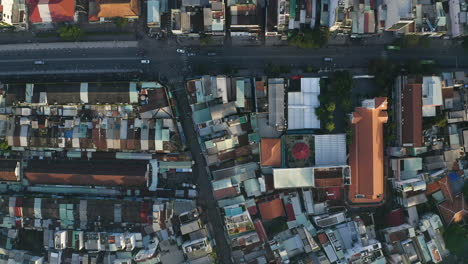 Early-morning-top-down-drone-view-of-Thi-Nghe-Market,-French-colonial-Church-and-bridge-over-the-Hoang-Sa-canal,-Binh-Thanh-district,-Ho-Chi-Minh-City