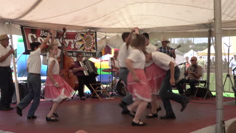 Kutztown,-Pennsylvania---July-1,-2019:-young-people-dancing-at-the-Kutztown-Fair-in-Kutztown,-Pennsylvania-on-July-1,-2019