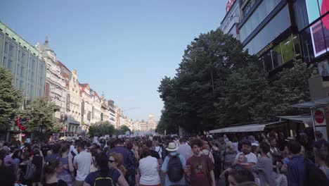 Crowd-of-people-at-demonstration-in-Prague,-Czech-Republic,-back-view