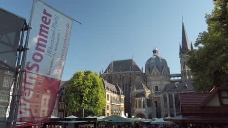 Wine-festival-with-people-and-market-stands,-located-on-the-Katschhof-square-in-the-German-city-of-Aachen