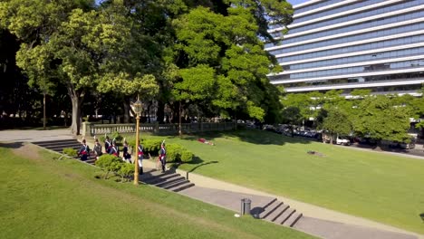 Aerial-of-The-Regiment-of-Patricians-walking-on-the-stairs-of-Plaza-San-Martin,-Buenos-Aires