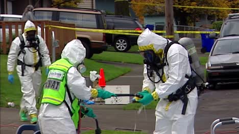 HAZMAT-CREW-MEMBER-CLEANING-CONTAMINATED-HANDS