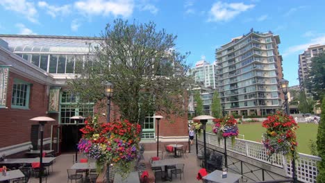 POV-from-Tour-Bus-driving-by-Canadian-Pacific-Lawn-Bowling-Club-on-Belleville-Street-in-downtown-Victoria-BC