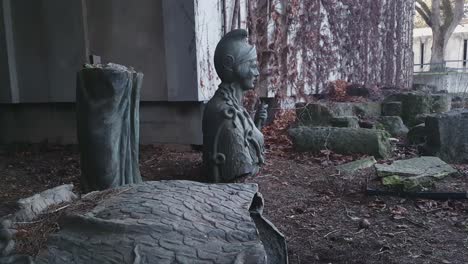 Parts-Of-The-Sculpture-In-The-Courtyard-Of-The-Museum-Sainte-Croix-In-Poitiers,-France