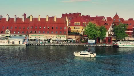 The-motorboat-passes-the-quay-of-the-historic-resort