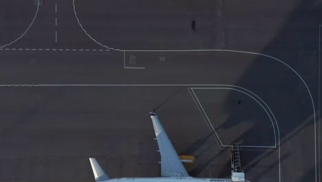 Flying-directly-above-two-Boeing-757-airplanes-during-sunset-at-Iceland-airport