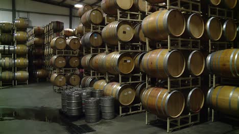 PANNING-SHOT-OF-SEVERAL-WINE-BARRELS-IN-STORAGE