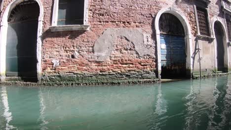 Taking-a-gondola-ride-in-Venice,-Italy-is-a-must-when-you-visit-this-city