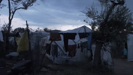 Moria-refugee-camp-'Jungle'-over-spill-dire-living-conditions-clothing-line-night