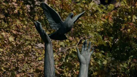 Prague-October-13-of-2019---Alegorie-Miru-statue-in-Prague-on-windy-day