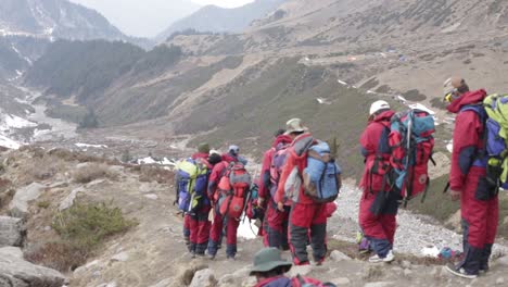 Beautiful-view-of-upper-Himalayas---Himalayan-trekkers-on-their-way-to-the-trail-or-destination-to-summit-Himalayas-peak