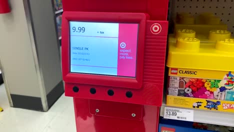 Hand-scanning-the-bar-code-to-check-the-price-of-a-popular-toy-item-at-Target