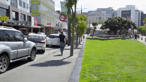 Looking-down-Dixon-St-in-Wellington,-NZ-while-someone-walks-past-camera