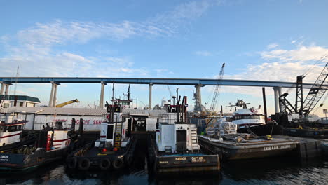 The-San-Diego-shipyard-by-the-Coronado-Bay-Bridge-on-a-bright-blue-day---wide-pan