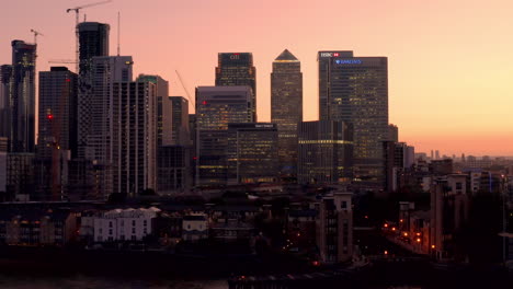 Aerial-view-of-London-Business-financial-district,-Canary-Wharf,-Isle-of-Dogs,-Canada-Square-with-an-awesome-sunset