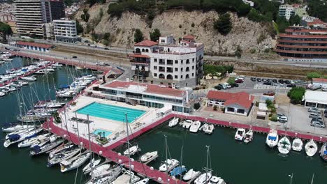 Aerial-orbit-view-of-the-harbour-with-moored-vacation-yachts