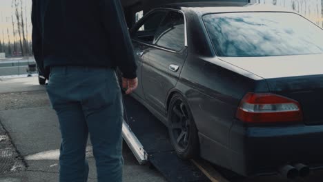 Pulling-a-Lowered-Nissan-Laurel-into-the-Back-of-an-Enclosed-Trailer