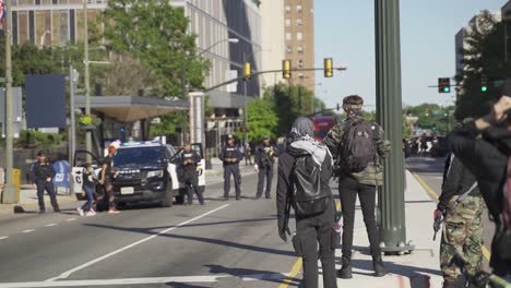 Richmond,-VA-USA---June-1st:-Civilians-with-guns-standing-off-to-the-police