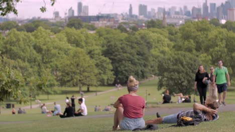 People-relaxing-in-Park-in-London