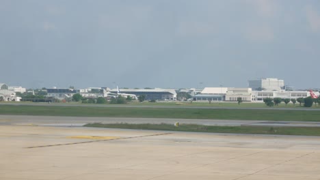 Landscape-view-in-the-Donmuang-international-airport-in-Bangkok-Thailand-with-airplane-take-off-from-the-airport