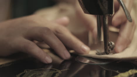 Close-up-of-Seamstress-working-on-a-sewing-machine