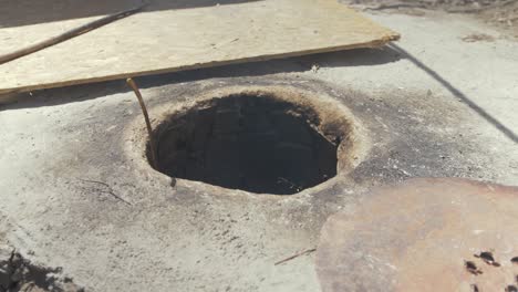 Smoke-billows-from-traditional-self-built-Tandoor-oven-at-refugee-camp-overspill