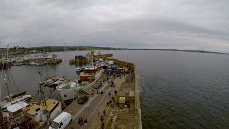 Penzance-Harbour-as-a-ship-moors-and-people-unload-and-depart-the-gangway