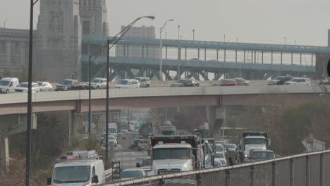 Layers-of-rush-hour-traffic-in-Philadelphia,-seen-from-Spring-Garden-Station