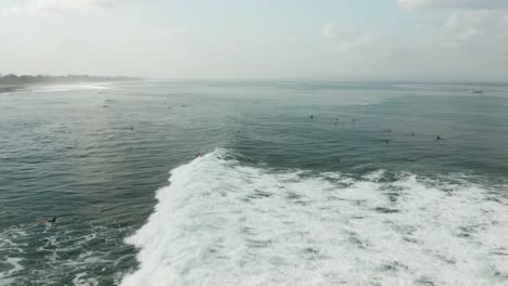 Male-Surfer-on-Surfing-Board-and-Wave-of-Indian-Ocean,-Aerial