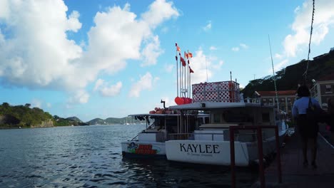 A-fish-market-with-boats-selling-the-catch-of-the-day-alongside-the-harbour