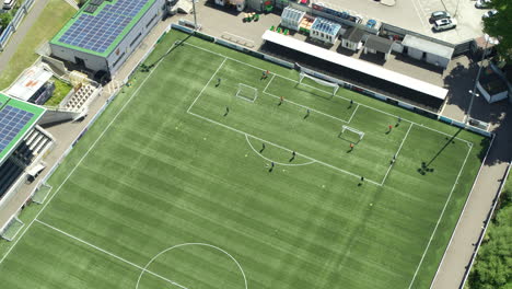 Static-aerial-establishing-shot-of-Maidstone-FC,-professional-football-team-in-training