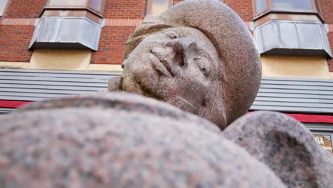 Mad-hatter-parallax-low-tea-party-granite-carved-sculpture-in-Warrington-town-Golden-square