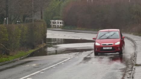 Vehicle-driving-stormy-flash-flooded-road-corner-after-heavy-rainfall