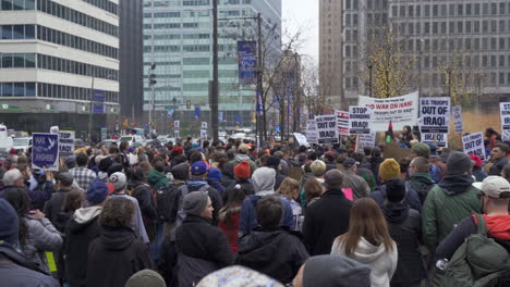 In-Philadelphia,-PA,-pan-right-view-of-protestors-gathered-at-City-Hall-concerning-the-death-of-Qassem-Soleimani-in-Iran-by-US-Government-and-Trump