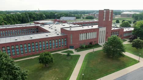 JP-McCaskey-High-School,-large-urban-public-school-establishing-shot-of-red-brick-school-building-built-in-early-1900s