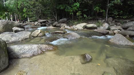 Very-relaxing-tropical-water-stream-at-Ulu-Bendul,-Malaysia,-Negeri-Sembilan