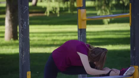 Fitness---Flexible-Fit-Young-Woman-Stretching-Before-Exercise-with-Face-Mask