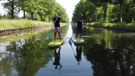 Two-brothers-peddling-on-top-of-a-sub