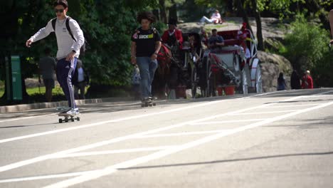 Bikes-pass-by-in-Central-Park,-NYC