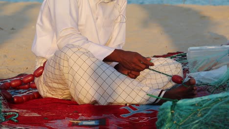 Hands-making-fishing-net