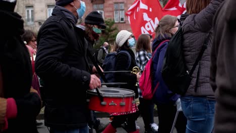 Men-playing-drums-and-participate-in-demonstration-against-a-new-security-law-that-would-restrict-publishing-images-of-police