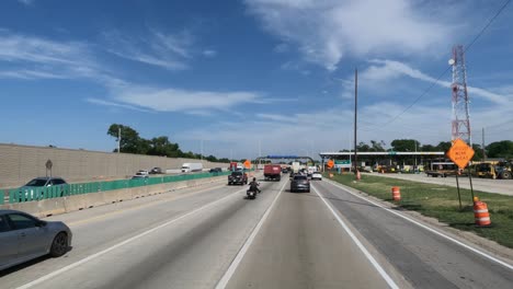 Traveling-in-Illinois-State-Tollway-roads-and-streets-construction-slow-traffic-at-rush-hour-near-Chicago-Ridge